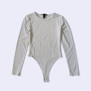 Cream heavy long sleeve bodysuit